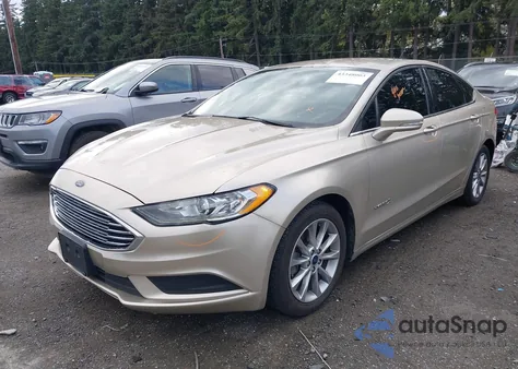 2017 Ford Fusion Hybrid Se z USA, uszkodzony, nr VIN 3FA6P0LU2HR130013
